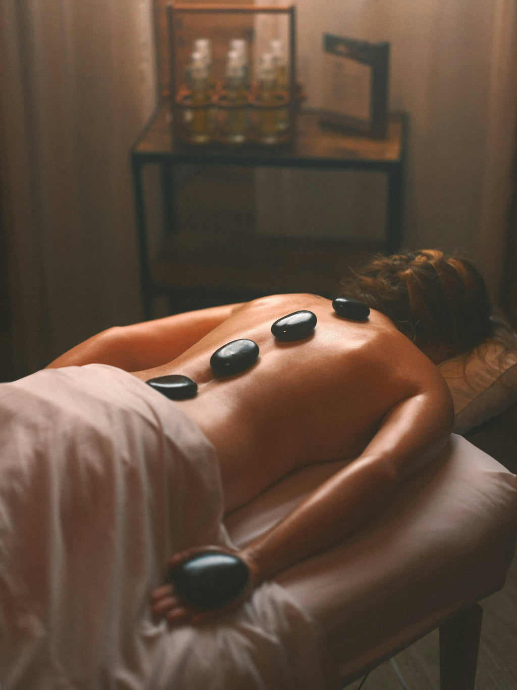Ember & Ease - Hot Stone Back Massage with Kim